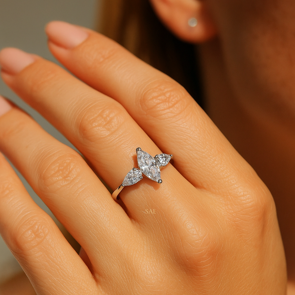 Marquise and side Pear Diamond Ring
Marquise with Pear shape Diamond Ring
Lab Grown Diamond Ring
Marquise Cut Engagement Ring
Fancy Shape Diamond Ring
Three Stone Ring
14k Gold Ring
Side Pear Diamonds
Gift for her
Diamond Jewelry
Bridal Ring
Engagement Ring
Wedding Ring