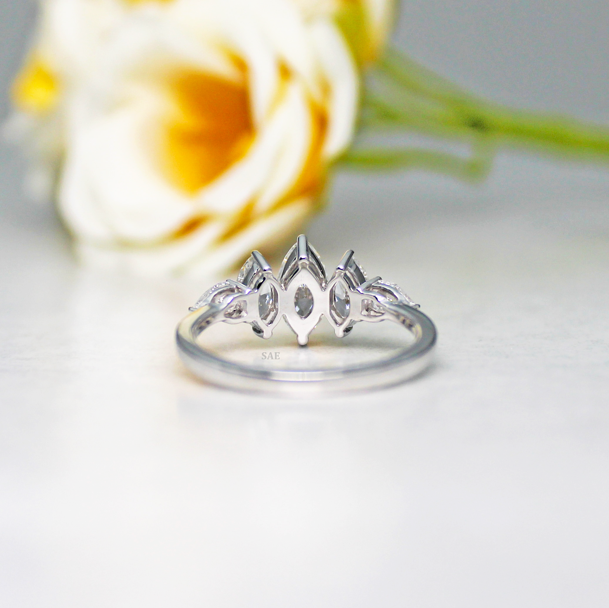 Marquise and side Pear Diamond Ring
Three Marquise with Pear shape Diamond Ring
Lab Grown Diamond Ring
Marquise Cut Engagement Ring
Fancy Shape Diamond Ring
Five Stone Ring
14k Gold Ring
Three step Marquise Ring
Gift for her
Diamond Jewelry
Bridal Ring
Engagement Ring
Wedding Ring