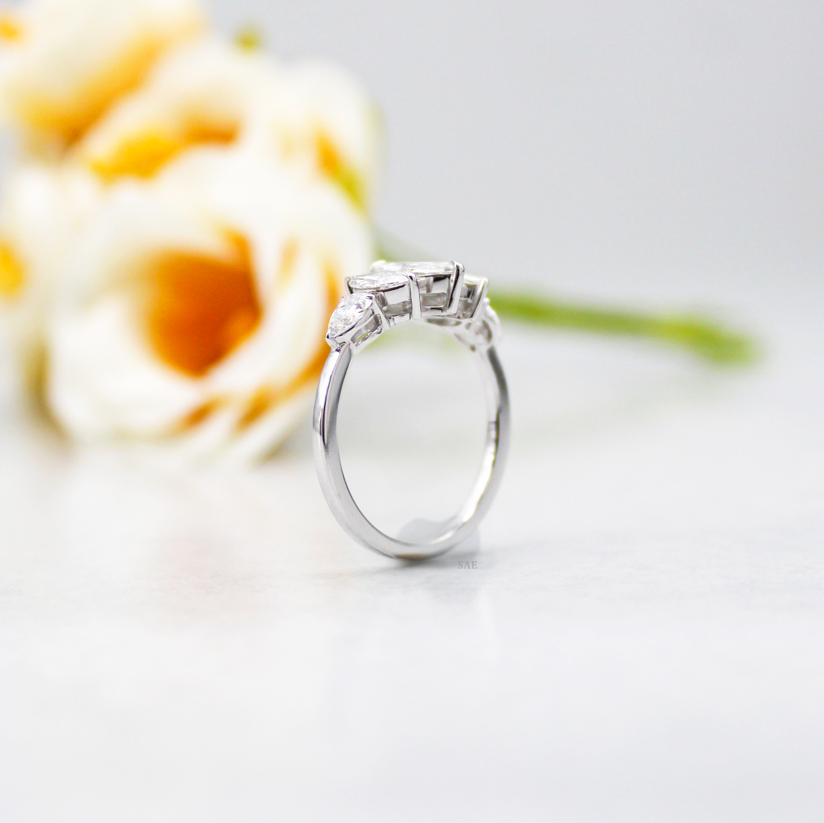 Marquise and side Pear Diamond Ring
Three Marquise with Pear shape Diamond Ring
Lab Grown Diamond Ring
Marquise Cut Engagement Ring
Fancy Shape Diamond Ring
Five Stone Ring
14k Gold Ring
Three step Marquise Ring
Gift for her
Diamond Jewelry
Bridal Ring
Engagement Ring
Wedding Ring